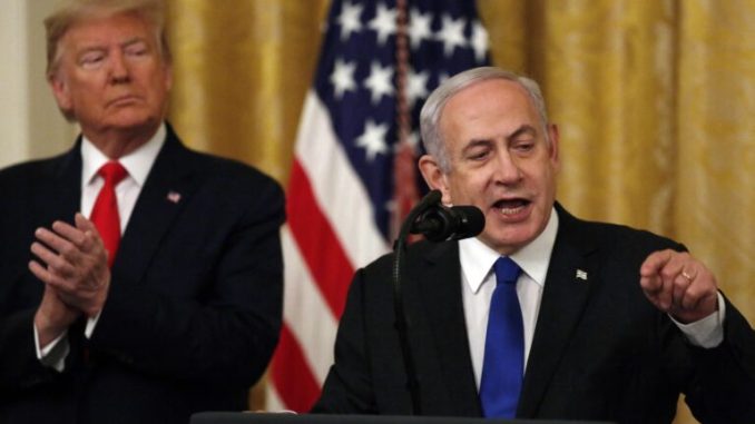 United States President Donald J. Trump listens as Israel's Prime Minister...